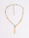 Vayu Earth, handmade, artisan, jewellery UK, unique jewellery, fashion accessories, handmade necklace, handcrafted necklace, earth jewellery, sustainable necklace, ethical necklace, fashion jewellery necklace, brass necklace, gold necklace, beaded necklace, glass beads, jewellery necklace, lost wax casting, beads on necklace, y necklace, aurora necklace, glass jewellery lariat gold necklace