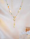 Vayu Earth, handmade, artisan, jewellery UK, unique jewellery, fashion accessories, handmade necklace, handcrafted necklace, earth jewellery, sustainable necklace, ethical necklace, fashion jewellery necklace, brass necklace, gold necklace, beaded necklace, glass beads, jewellery necklace, lost wax casting, beads on necklace, y necklace, aurora necklace, glass jewellery lariat gold necklace