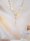 Vayu Earth, handmade, artisan, jewellery UK, unique jewellery, fashion accessories, handmade necklace, handcrafted necklace, earth jewellery, sustainable necklace, ethical necklace, fashion jewellery necklace, brass necklace, gold necklace, beaded necklace, glass beads, jewellery necklace, lost wax casting, beads on necklace, y necklace, aurora necklace, glass jewellery lariat gold necklace