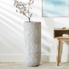 Decorative vase with geometric pattern in a room setting